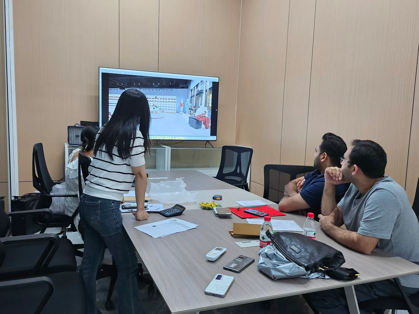 Project team reviewing store requirements and drawings