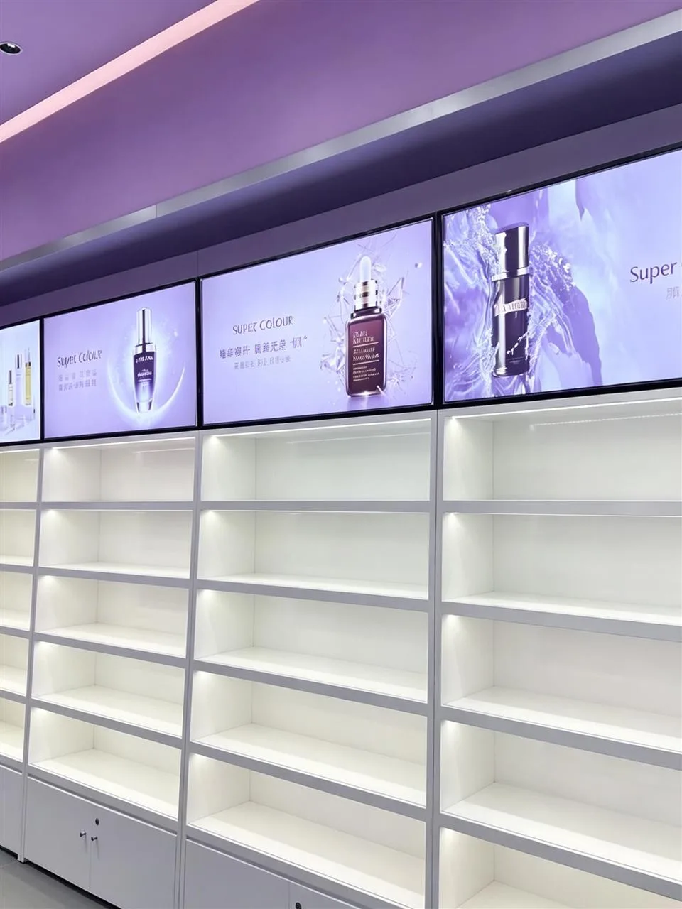 Lavender Sloped Display Table and Empty Wall Bays — reference view 2 of 5
