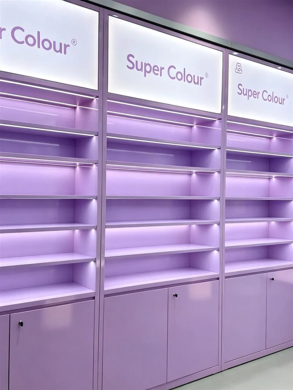 Lavender Sloped Display Table and Empty Wall Bays — reference view 4 of 5