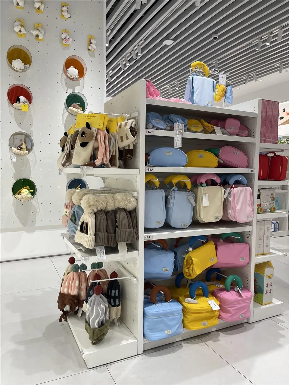 White Bag and Accessory Shelf beside a Feature Column