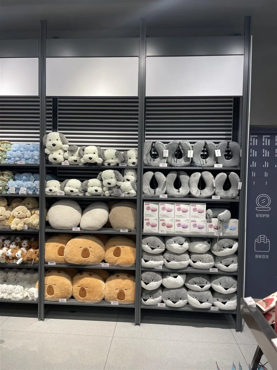 Low Gray Merchandise Table with Stepped Product Rows — reference view 10 of 10