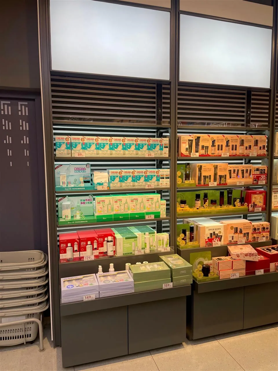 Dark Wall Display with Louvered Header and Boxed Goods
