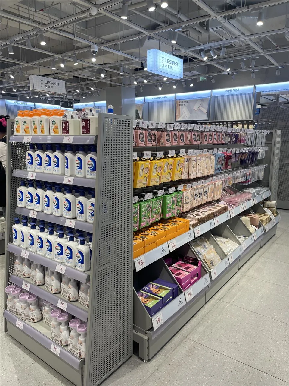 Freestanding Gray Shelf for Packaged Lifestyle Goods