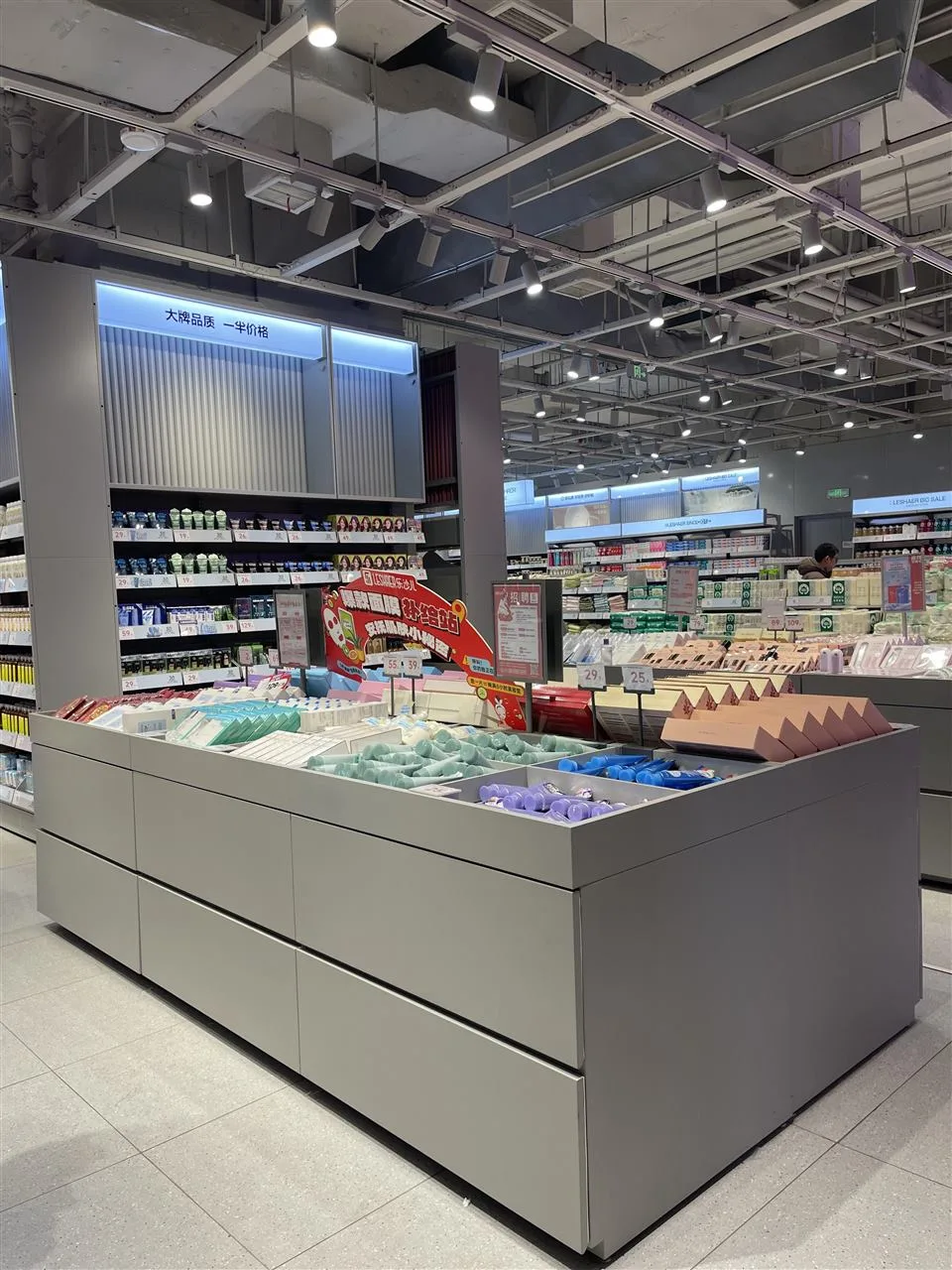 Wide Gray Island with Colorful Product Trays