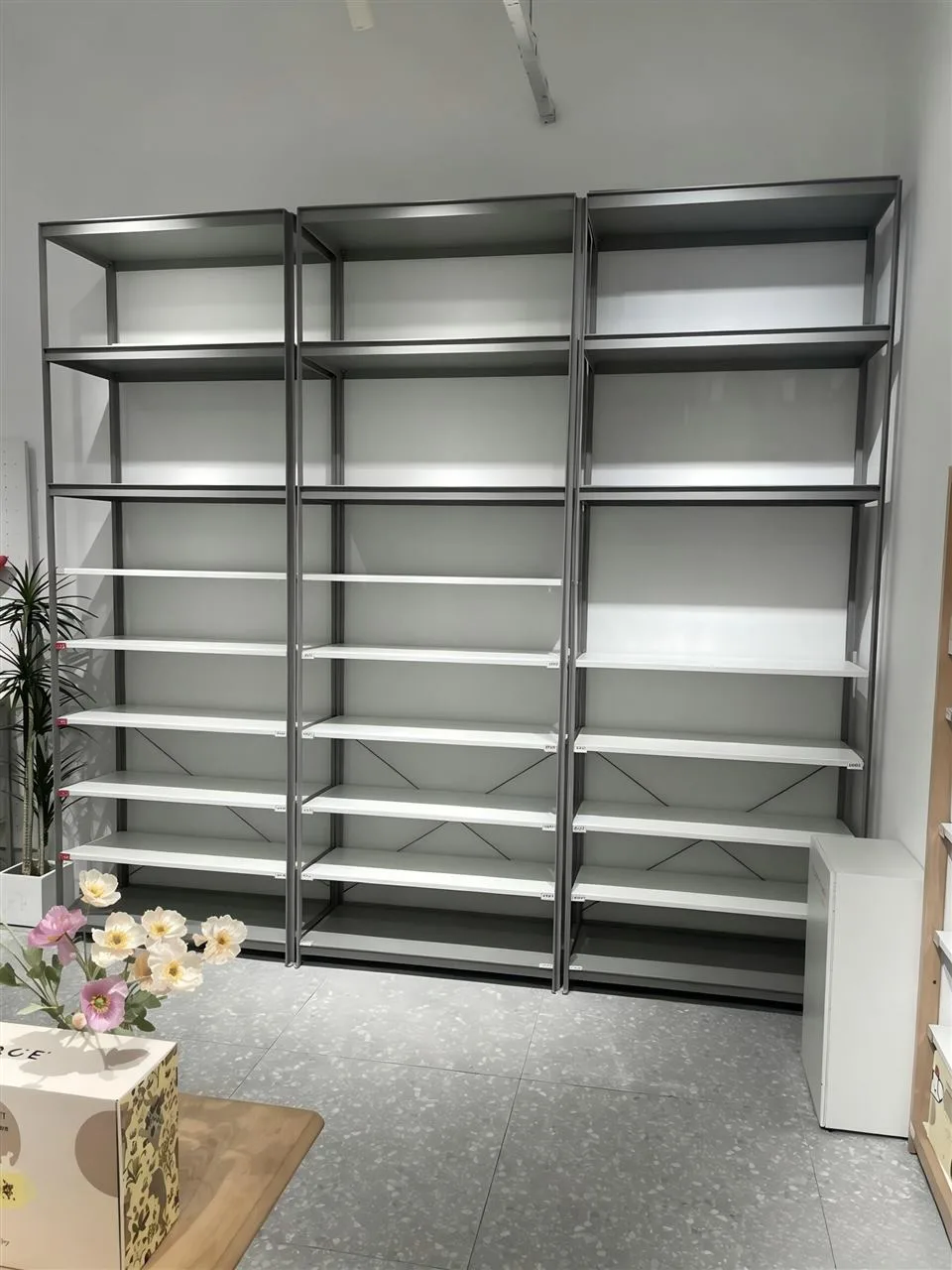 Gray Multi-Bay Wall Shelving with Horizontal Lights