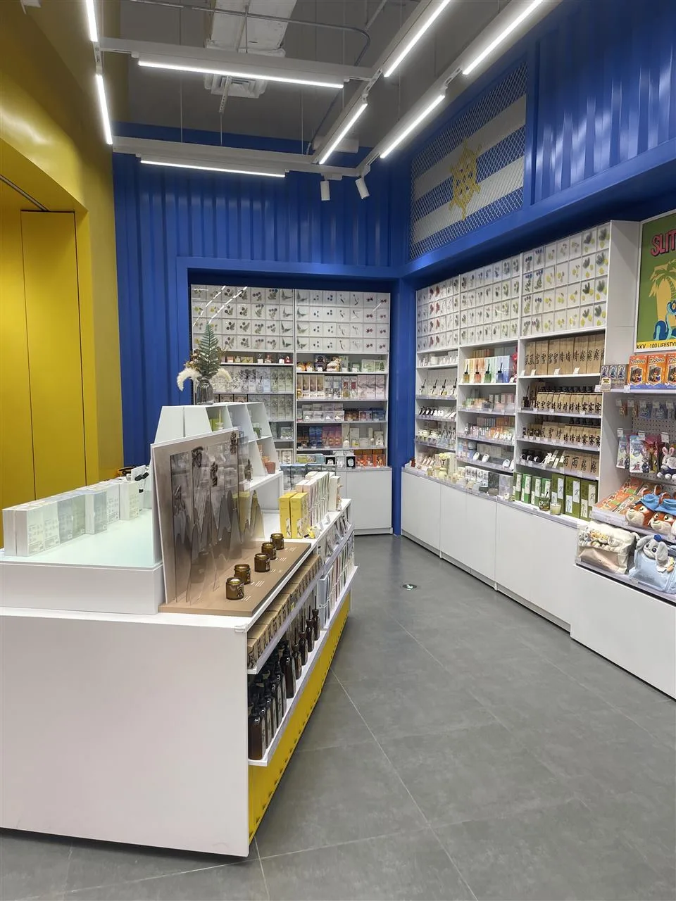 Blue and Yellow Blind Box Aisle with Wall Shelves — reference view 6 of 7