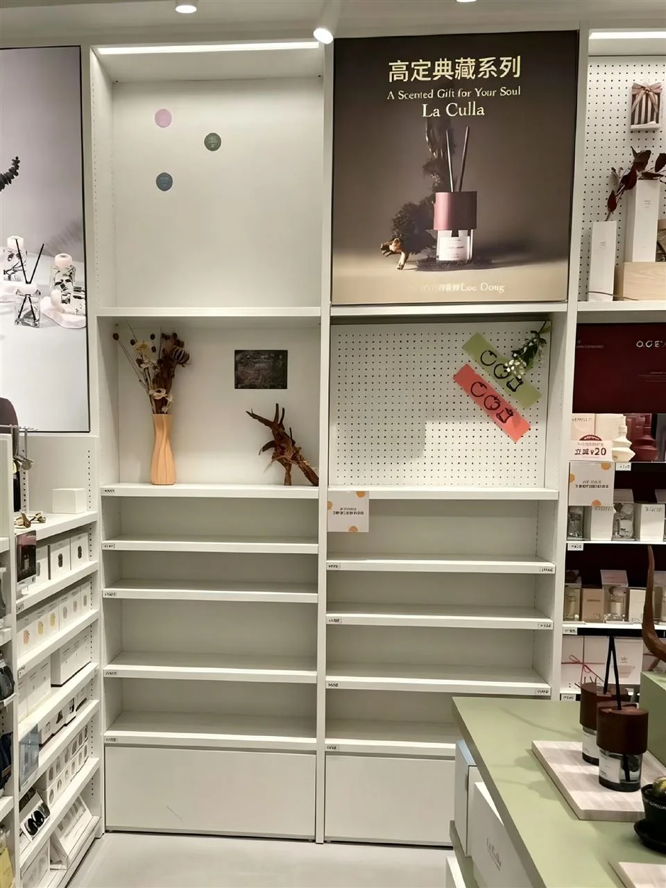White Product Wall with Large Graphic Panels
