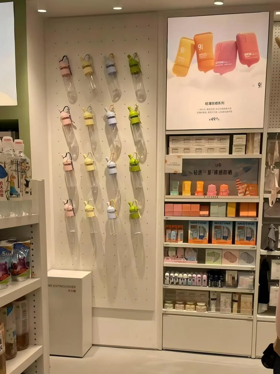 White Product Wall with Large Graphic Panels — reference view 2 of 9