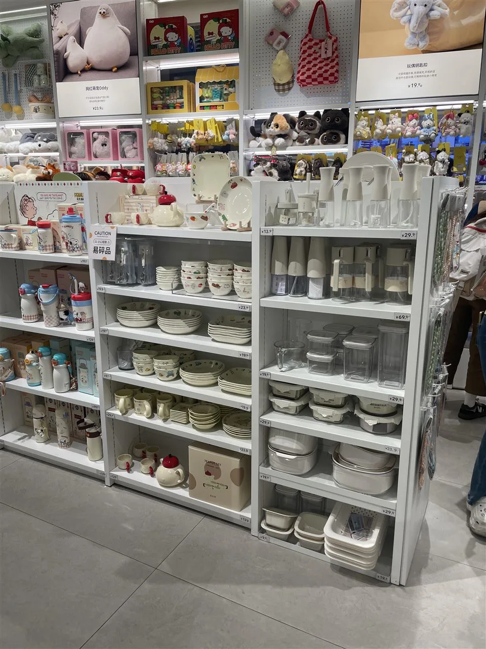 White Product Wall with Large Graphic Panels — reference view 7 of 9