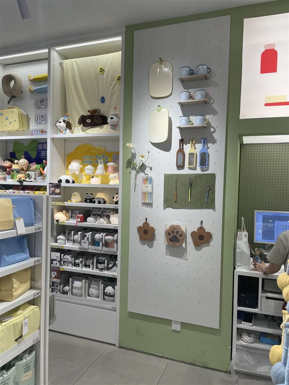 White Product Wall with Large Graphic Panels — reference view 9 of 9