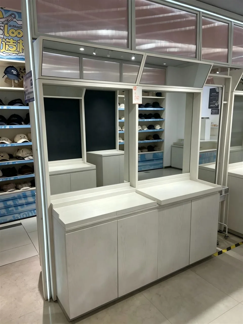 White Multi-Bay Wall Display with Base Cabinets — reference view 13 of 18