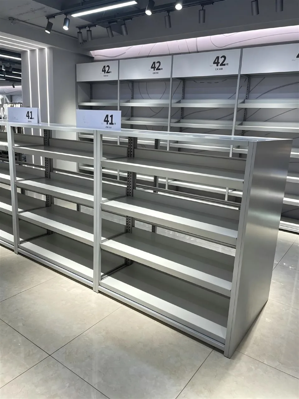 Gray Lifestyle Shelving with Illuminated Header — reference view 2 of 17