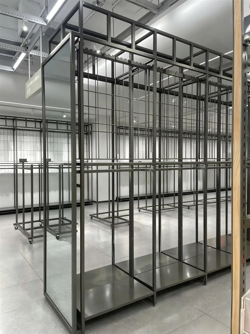 Dark Frame Apparel Display with Two Hanging Levels — reference view 7 of 17
