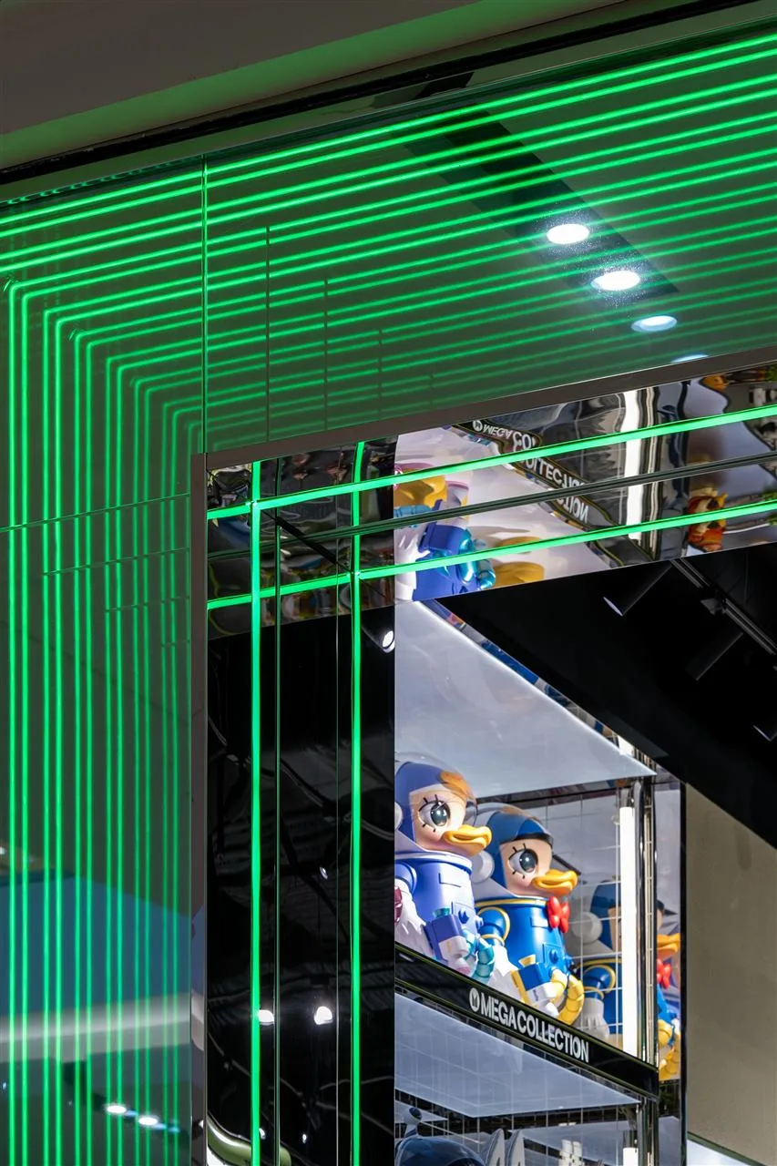 Green-Lit Toy Store Entrance Reference — reference view 5 of 8