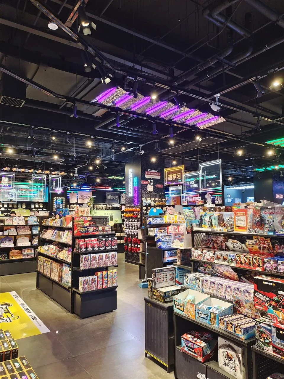 Dark Neon Collectible Store with Hanging Sign Frames — reference view 4 of 4