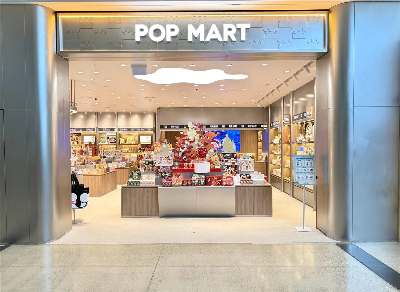 Pale Toy Storefront with Broad Illuminated Fascia